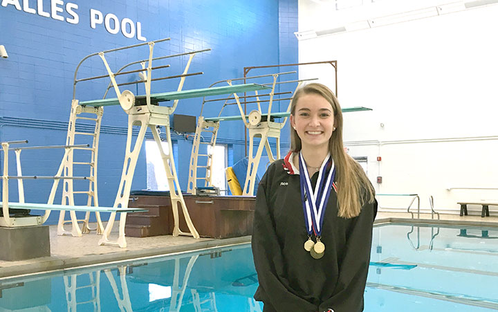 Three time champion Claire Ross dives into victory