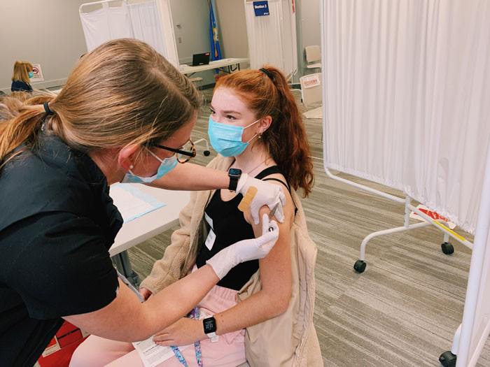 Student EMTs respond to getting the COVID-19 vaccine